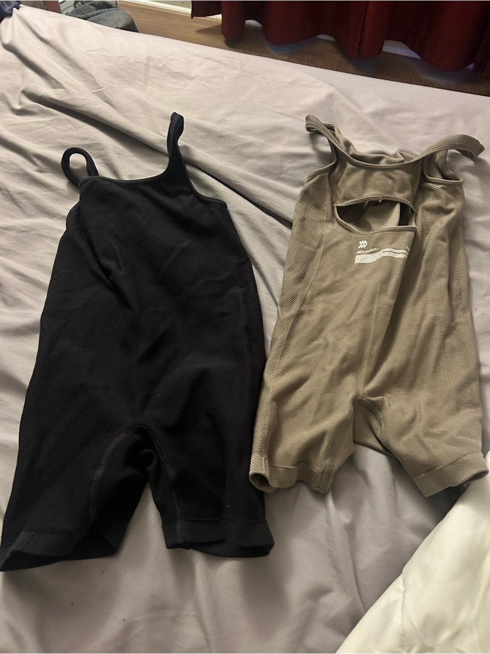 all in motion Black and Taupe Kids One-Pieces